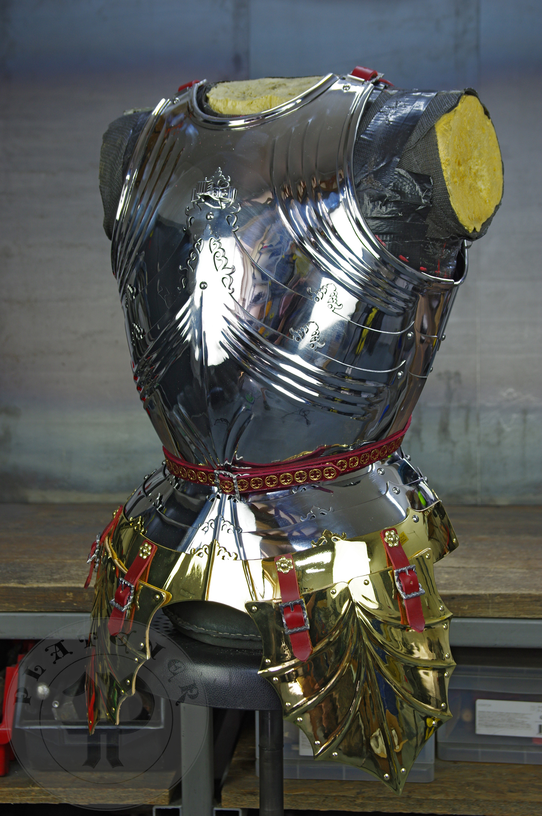 The high gothic set circa 1480-1485 in Helmschmied style consists of sallet, bevor and cuirass. They are made of steel in various thickness: 2 mm; 1,5 mm and 1,2 mm and heat hardened and tempered up to 42 HRC for cuirass with bevor and 38 HRC for sallet. The visor, lower lames and tassets are brass gilded. I also crafted handmade steel buckles for this set. Overall it involved around 850 of work hours to make it.