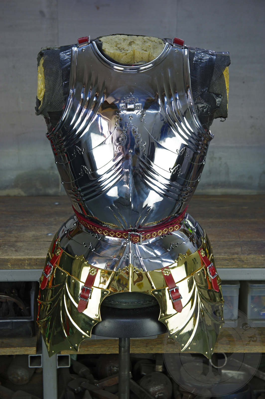 The high gothic set circa 1480-1485 in Helmschmied style consists of sallet, bevor and cuirass. They are made of steel in various thickness: 2 mm; 1,5 mm and 1,2 mm and heat hardened and tempered up to 42 HRC for cuirass with bevor and 38 HRC for sallet. The visor, lower lames and tassets are brass gilded. I also crafted handmade steel buckles for this set. Overall it involved around 850 of work hours to make it.