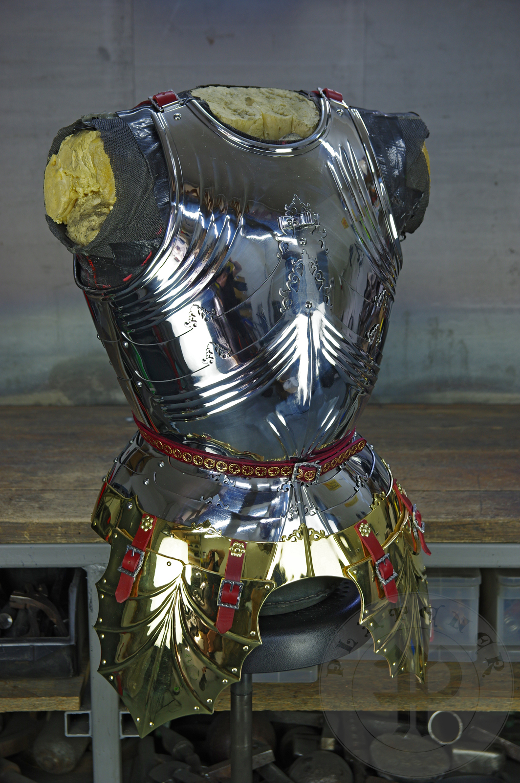 The high gothic set circa 1480-1485 in Helmschmied style consists of sallet, bevor and cuirass. They are made of steel in various thickness: 2 mm; 1,5 mm and 1,2 mm and heat hardened and tempered up to 42 HRC for cuirass with bevor and 38 HRC for sallet. The visor, lower lames and tassets are brass gilded. I also crafted handmade steel buckles for this set. Overall it involved around 850 of work hours to make it.