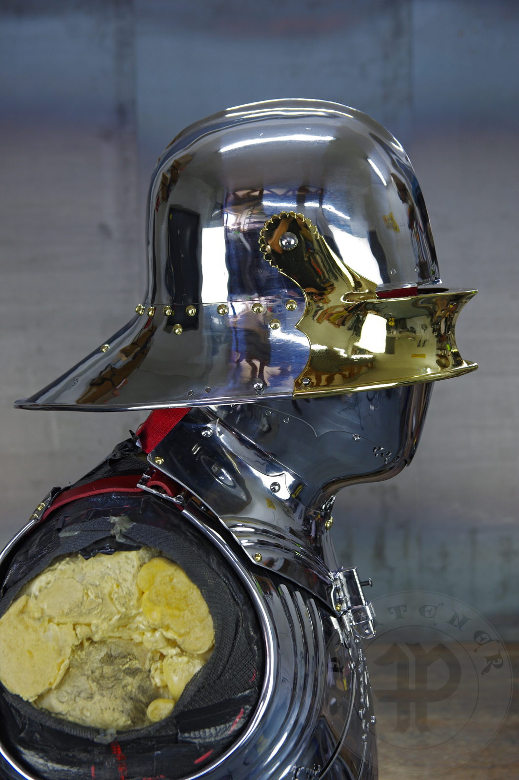 The high gothic set circa 1480-1485 in Helmschmied style consists of sallet, bevor and cuirass. They are made of steel in various thickness: 2 mm; 1,5 mm and 1,2 mm and heat hardened and tempered up to 42 HRC for cuirass with bevor and 38 HRC for sallet. The visor, lower lames and tassets are brass gilded. I also crafted handmade steel buckles for this set. Overall it involved around 850 of work hours to make it.