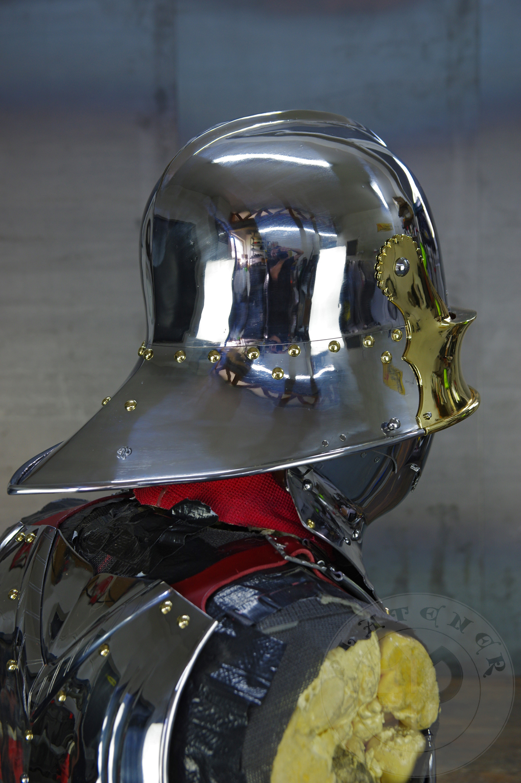 The high gothic set circa 1480-1485 in Helmschmied style consists of sallet, bevor and cuirass. They are made of steel in various thickness: 2 mm; 1,5 mm and 1,2 mm and heat hardened and tempered up to 42 HRC for cuirass with bevor and 38 HRC for sallet. The visor, lower lames and tassets are brass gilded. I also crafted handmade steel buckles for this set. Overall it involved around 850 of work hours to make it.