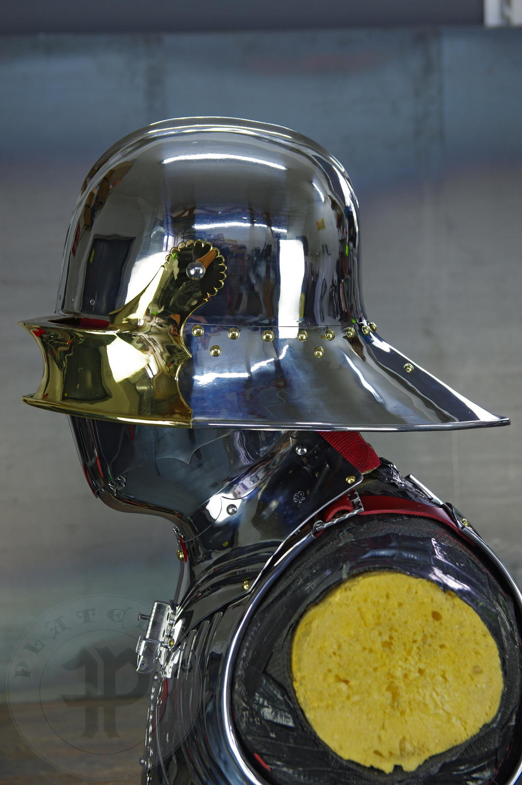 The high gothic set circa 1480-1485 in Helmschmied style consists of sallet, bevor and cuirass. They are made of steel in various thickness: 2 mm; 1,5 mm and 1,2 mm and heat hardened and tempered up to 42 HRC for cuirass with bevor and 38 HRC for sallet. The visor, lower lames and tassets are brass gilded. I also crafted handmade steel buckles for this set. Overall it involved around 850 of work hours to make it.