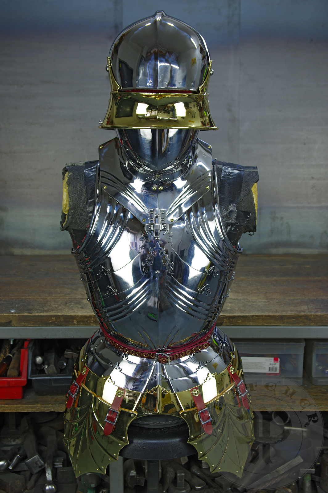 The high gothic set circa 1480-1485 in Helmschmied style consists of sallet, bevor and cuirass. They are made of steel in various thickness: 2 mm; 1,5 mm and 1,2 mm and heat hardened and tempered up to 42 HRC for cuirass with bevor and 38 HRC for sallet. The visor, lower lames and tassets are brass gilded. I also crafted handmade steel buckles for this set. Overall it involved around 850 of work hours to make it.