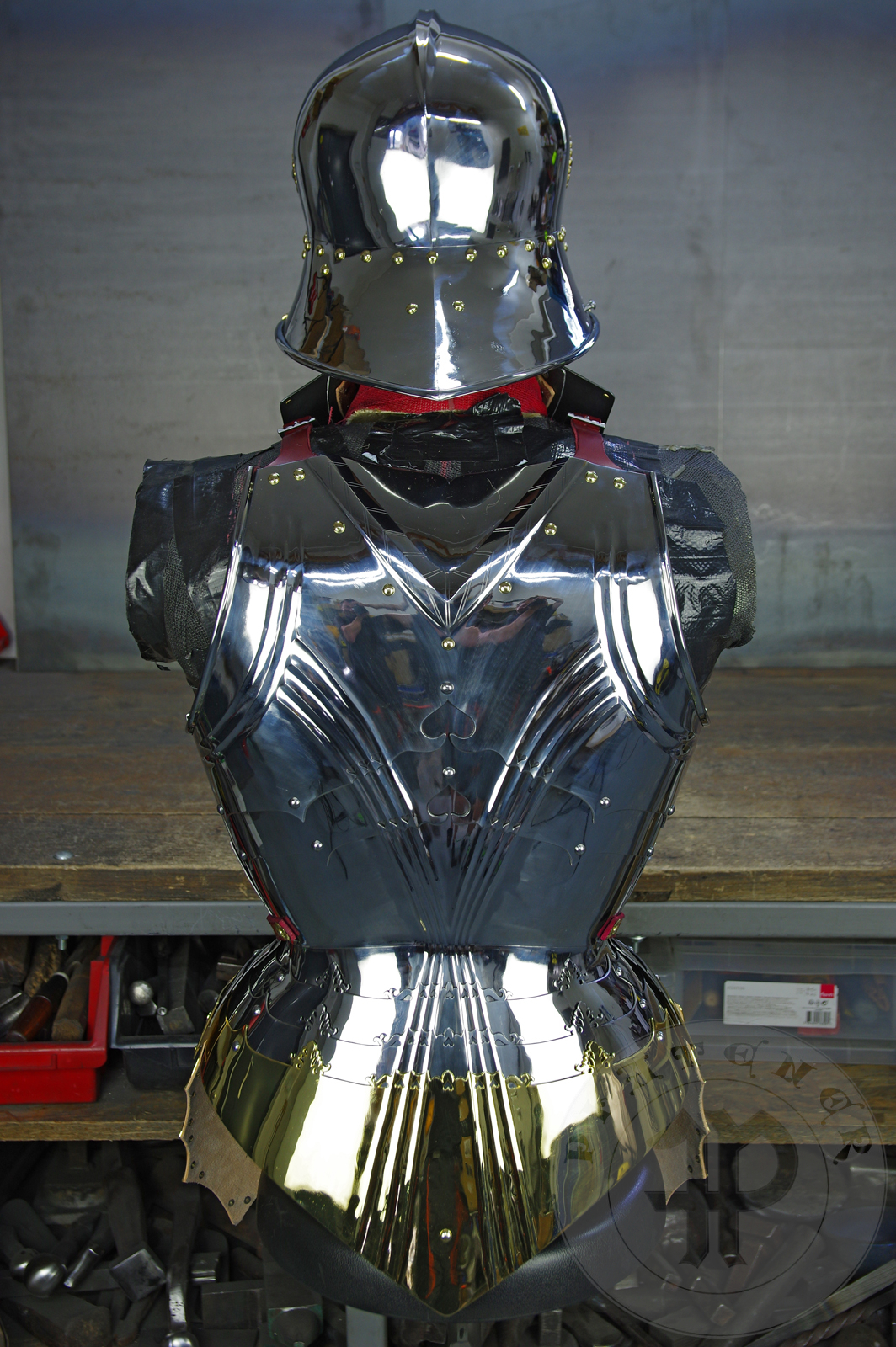 The high gothic set circa 1480-1485 in Helmschmied style consists of sallet, bevor and cuirass. They are made of steel in various thickness: 2 mm; 1,5 mm and 1,2 mm and heat hardened and tempered up to 42 HRC for cuirass with bevor and 38 HRC for sallet. The visor, lower lames and tassets are brass gilded. I also crafted handmade steel buckles for this set. Overall it involved around 850 of work hours to make it.