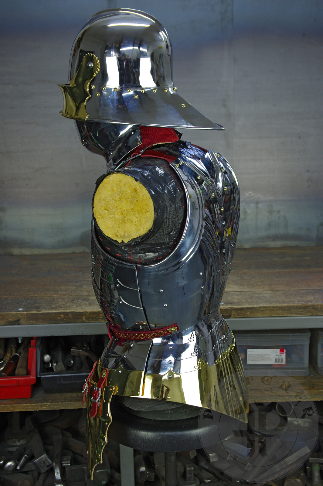 The high gothic set circa 1480-1485 in Helmschmied style consists of sallet, bevor and cuirass. They are made of steel in various thickness: 2 mm; 1,5 mm and 1,2 mm and heat hardened and tempered up to 42 HRC for cuirass with bevor and 38 HRC for sallet. The visor, lower lames and tassets are brass gilded. I also crafted handmade steel buckles for this set. Overall it involved around 850 of work hours to make it.