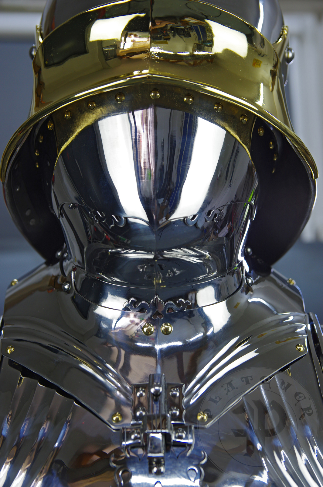 The high gothic set circa 1480-1485 in Helmschmied style consists of sallet, bevor and cuirass. They are made of steel in various thickness: 2 mm; 1,5 mm and 1,2 mm and heat hardened and tempered up to 42 HRC for cuirass with bevor and 38 HRC for sallet. The visor, lower lames and tassets are brass gilded. I also crafted handmade steel buckles for this set. Overall it involved around 850 of work hours to make it.