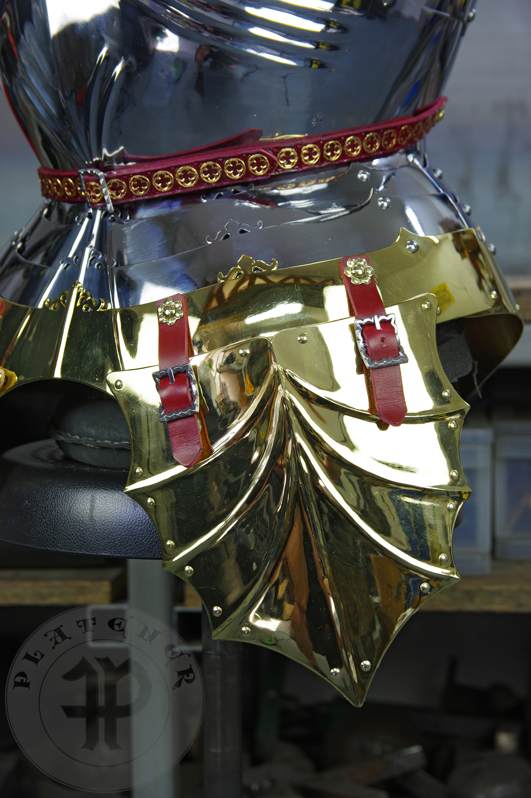 The high gothic set circa 1480-1485 in Helmschmied style consists of sallet, bevor and cuirass. They are made of steel in various thickness: 2 mm; 1,5 mm and 1,2 mm and heat hardened and tempered up to 42 HRC for cuirass with bevor and 38 HRC for sallet. The visor, lower lames and tassets are brass gilded. I also crafted handmade steel buckles for this set. Overall it involved around 850 of work hours to make it.